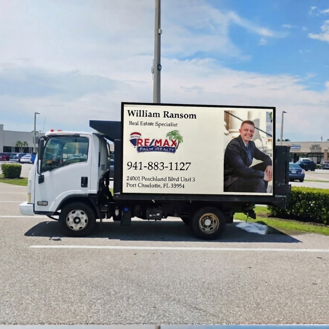 Tweety Bird Inc mobile billboard truck carrying a real estate campaign
