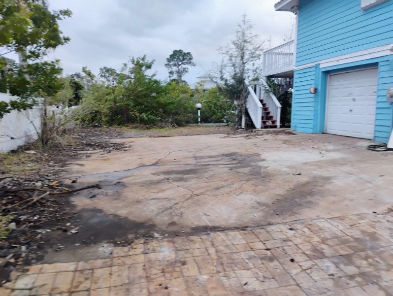 Driveway cleared after abandoned car removal
