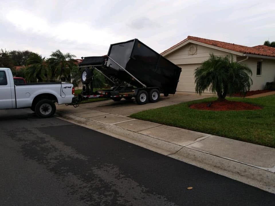 Tweety Bird Inc dumpster trailer arriving on a hauling job in Port Charlotte, FL