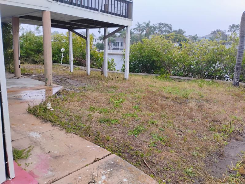 Waterfront yard cleared after debris removal